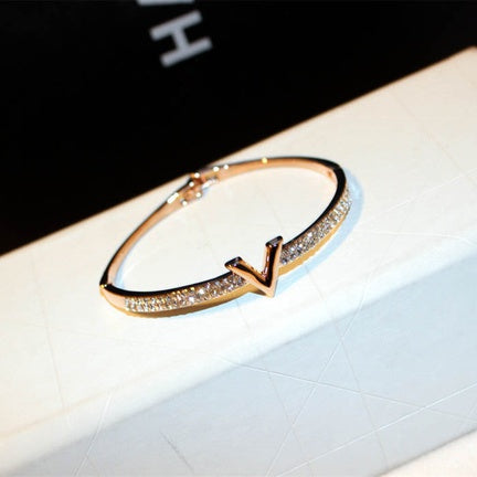 V gem-encrusted bangle - NWT